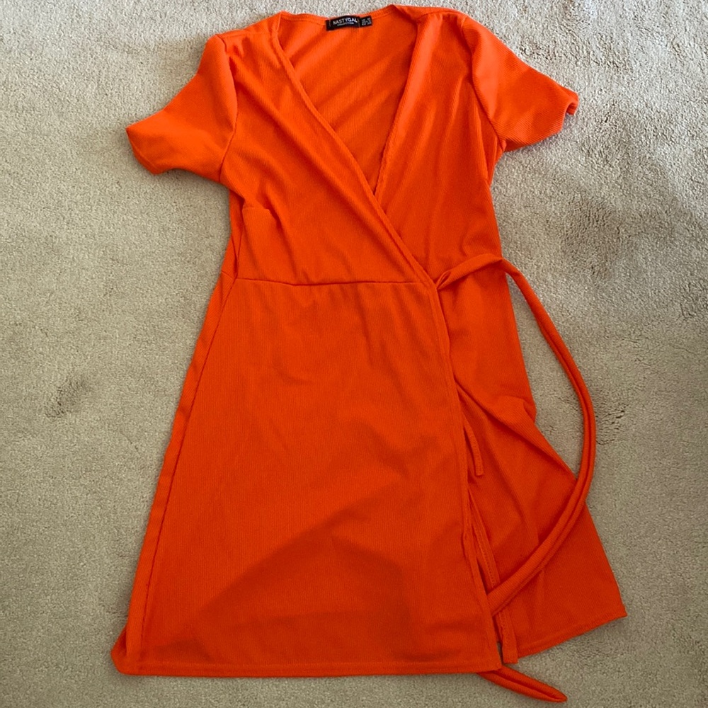 NastyGal orange wrap dress. US size 6. Like new - worn once.